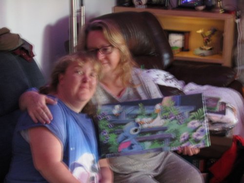 mom and Melissa opening presents